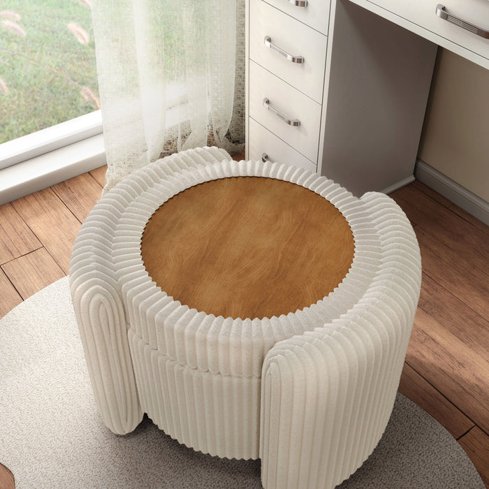 Left facing modern tufted beige pink chenille round storage ottoman with a flip top in a room with accessories