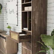 Left facing of a santee storage media tower shelving unit in a room with accessories with a drawer opened