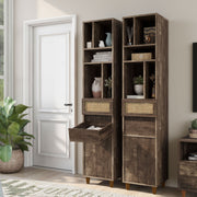 Left facing of two santee storage media tower shelving units in a room with accessories