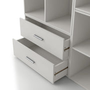 Left facing modern two-drawer white storage cabinet with silver handles and drawers open in a larger modular bookcase on a white background