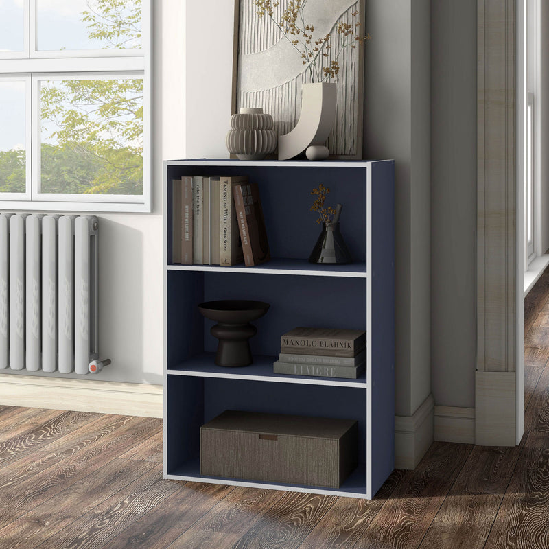 Left facing durable modern three-shelf steel blue storage bookcase in a larger modular configuration in a room with accessories