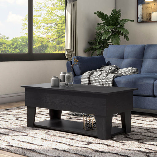 Left facing contemporary lift-top black storage coffee table in a living room with accessories