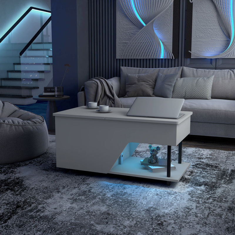 Left facing contemporary white storage coffee table with shelves, a lift top and LED lighting in a living room with accessories