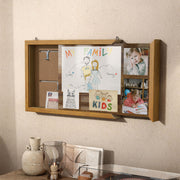 Left facing open view of a contemporary hanging golden oak finish wood photo frame sliding cabinet hung with pictures