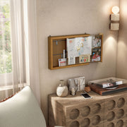 Right facing open view of a contemporary hanging golden oak finish wood photo frame sliding cabinet hung with pictures