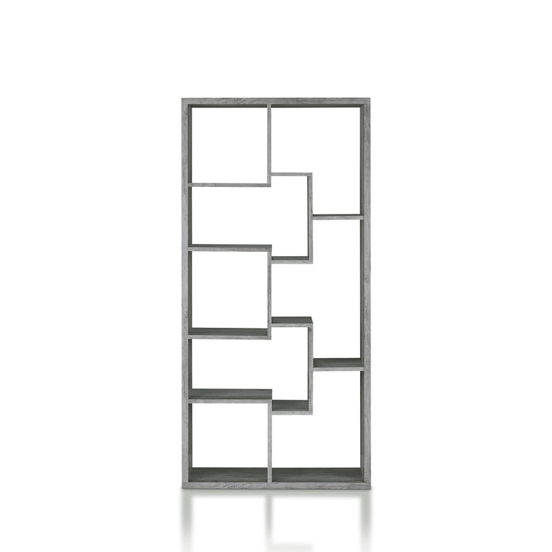 Front-facing modern grey oak geometric bookcase with staggered shelves on a white background