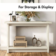 Right facing contemporary soft white rectangular console with a charging panel in a room with accessories