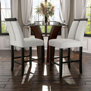 Angled set of two contemporary black with white boucle counter height stools in a room with accessories