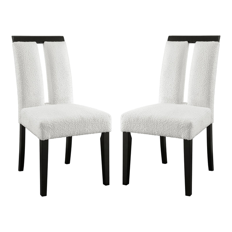 Angled set of two contemporary black with white boucle dining side chairs on a white background