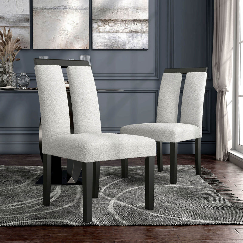 Angled set of two contemporary black with white boucle dining side chairs in a room with accessories