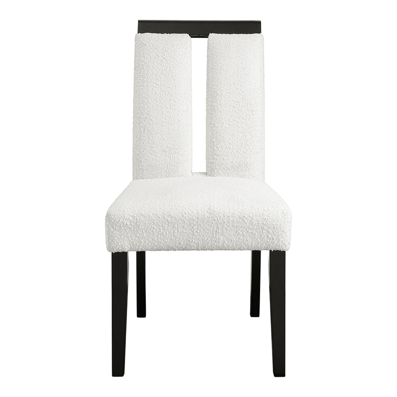 Front facing single side view of a set of two contemporary black with white boucle dining side chairs on a white background