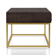 Side-facing contemporary walnut gold coffee table on a white background. Slim gold steel base and geometric texture wood drawer fronts offers lovely attention to detail.