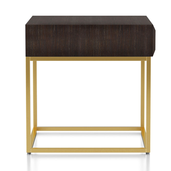 Side-facing contemporary walnut gold end table on a white background. Slim gold steel base and geometric texture wood drawer front offers lovely attention to detail.