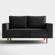 Front facing contemporary black and metallic boucle loveseat on a white background