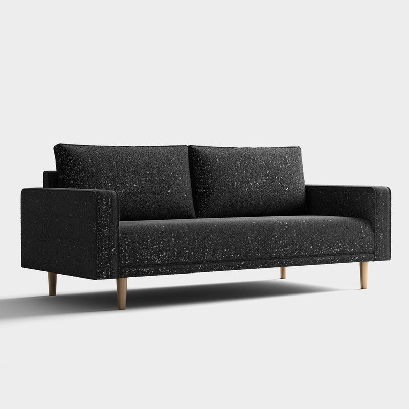 Right facing contemporary black and metallic boucle sofa on a white background