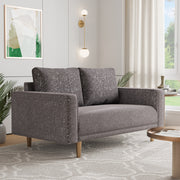 Right facing contemporary charcoal gray and metallic boucle loveseat in a room with accessories