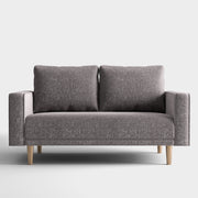 Front facing contemporary charcoal gray and metallic boucle loveseat on a white background
