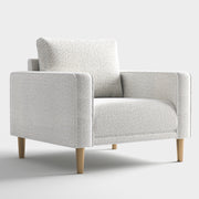 Right facing contemporary off-white metallic boucle accent armchair on a white background