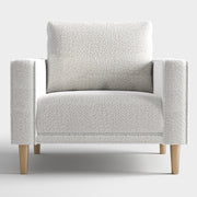 Front facing contemporary off-white metallic boucle accent armchair on a white background