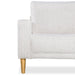 Front facing close up of the armrest, leg, and upholstery of a contemporary off-white metallic boucle loveseat on a white background