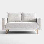 Front facing contemporary off-white metallic boucle loveseat on a white background
