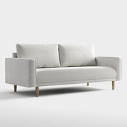 Right facing contemporary off-white metallic boucle sofa on a white background
