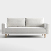 Front facing contemporary off-white metallic boucle sofa on a white background