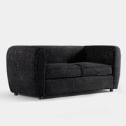 Right facing contemporary black metallic boucle shelter loveseat on a white background