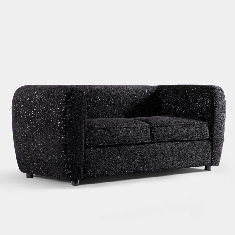 Right facing contemporary black metallic boucle shelter loveseat on a white background