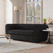 Left facing contemporary black metallic boucle shelter sofa in a room with accessories