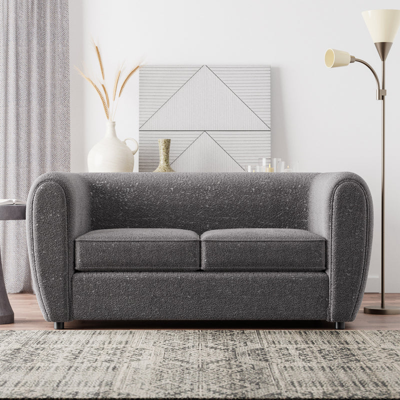 Front facing contemporary charcoal gray metallic boucle shelter loveseat in a room with accessories