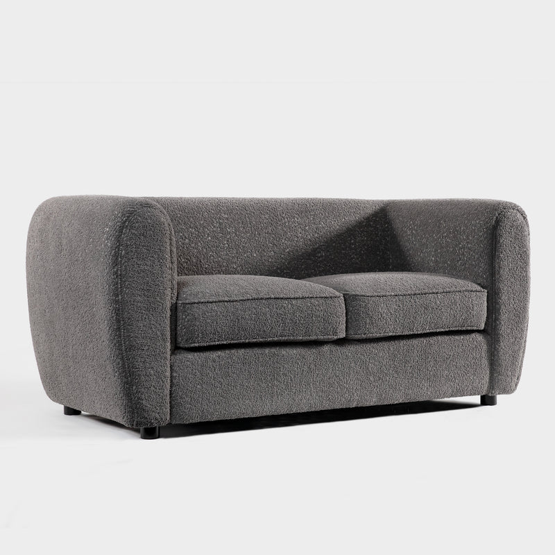Right facing contemporary charcoal gray metallic boucle shelter loveseat on a white background