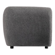 Front facing side view of a contemporary charcoal gray metallic boucle shelter sofa on a white background