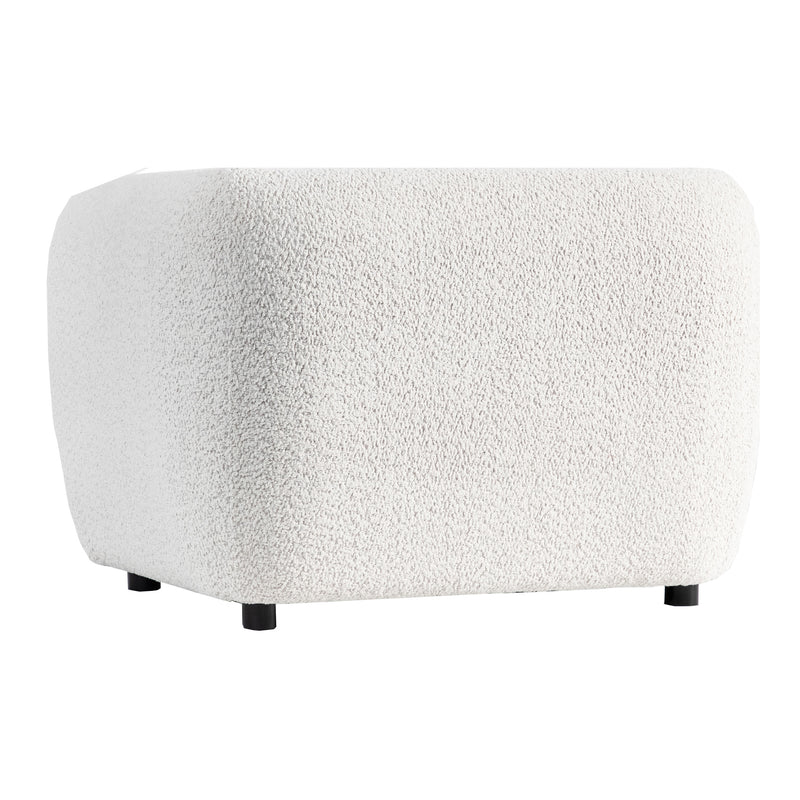 Right facing side view of a contemporary off-white metallic boucle shelter armchair on a white background
