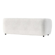 Right facing back view of a contemporary off-white metallic boucle shelter sofa on a white background