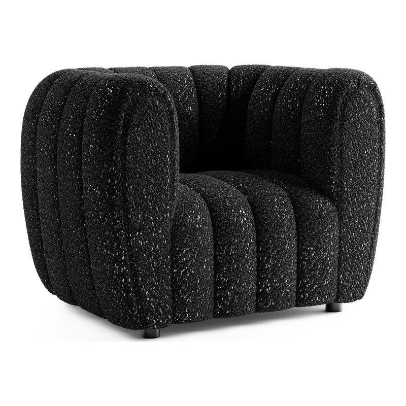 Right facing contemporary black and metallic boucle tufted shelter armchair on a white background