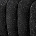 Front facing close up upholstery and tufting of a contemporary black and metallic boucle tufted shelter sofa 