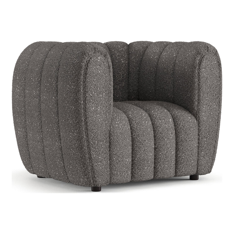 Left facing contemporary charcoal gray and metallic boucle tufted shelter armchair on a white background