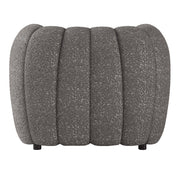Front facing back view of a contemporary charcoal gray and metallic boucle tufted shelter armchair on a white background