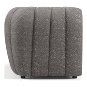 Front facing side view of a contemporary charcoal gray and metallic boucle tufted shelter loveseat on a white background