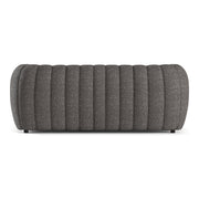 Front facing back view of a contemporary charcoal gray and metallic boucle tufted shelter sofa on a white background
