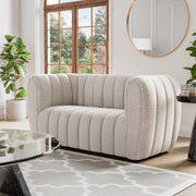 Left facing contemporary off-white metallic boucle tufted shelter loveseat in a room with accessories