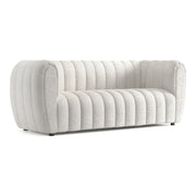 Right facing contemporary off-white metallic boucle tufted shelter sofa on a white background