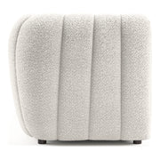 Front facing side view of a contemporary off-white metallic boucle tufted shelter sofa on a white background