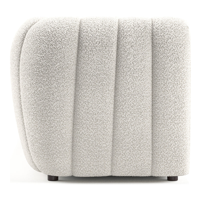 Front facing side view of a contemporary off-white metallic boucle tufted shelter sofa on a white background