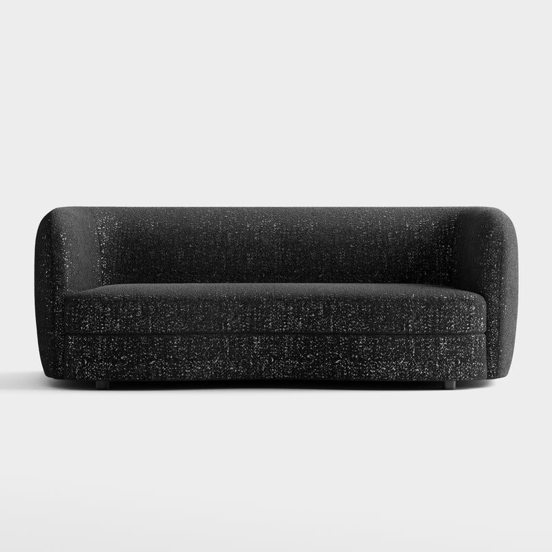 Front facing contemporary black and metallic boucle curved kidney sofa on a white background