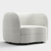 Right facing contemporary off-white metallic boucle curved kidney armchair on a white background