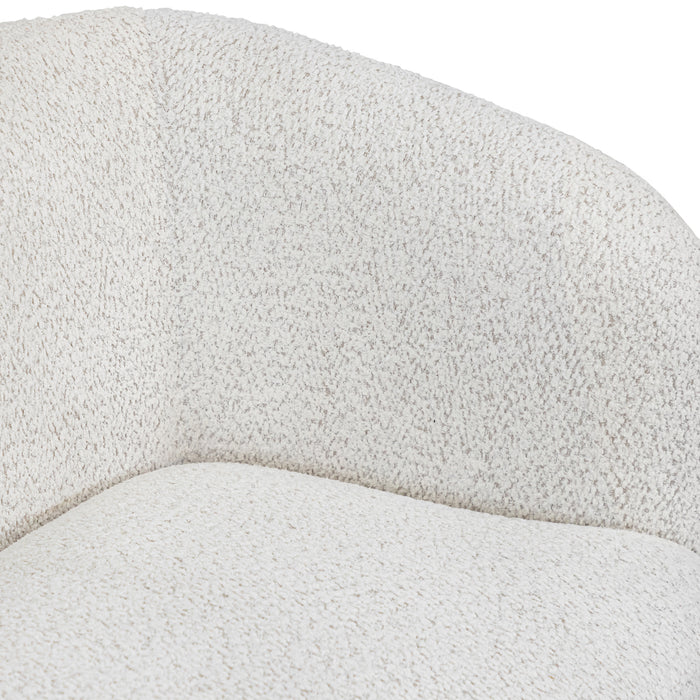 Right facing close up view of the inner armrest on a contemporary off-white metallic boucle curved kidney loveseat on a white background
