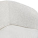 Right facing close up view of the inner armrest on a contemporary off-white metallic boucle curved kidney loveseat on a white background