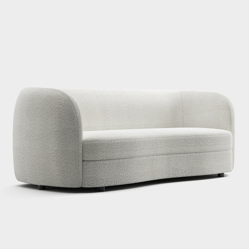 Right facing contemporary off-white metallic boucle curved kidney sofa on a white background
